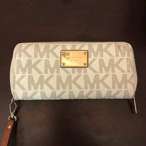 Micheal Kors wallet.